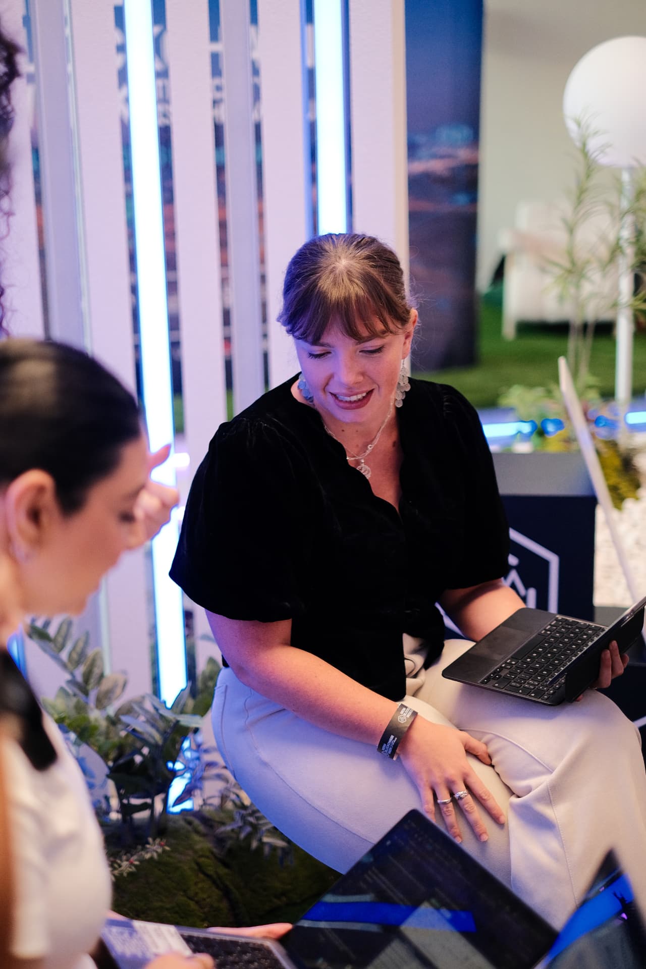 Member carrying a laptop after a session